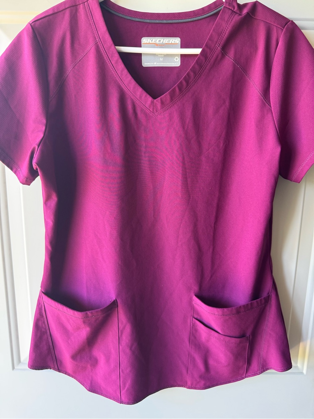 Skechers Women's Short Sleeve V-Neck Top in Magenta
